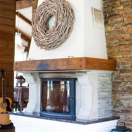 Holiday home Cozy In With Jacuzzi And Sauna